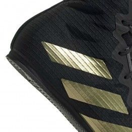 Zapatilla box hog 4 negra/dorada gz6116